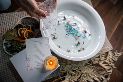 Calming herbal foot soak with affirmation cards — grounding ritual element